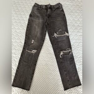 Pacsun, blk denim mom jeans, holes in the front. Size 23, worn a few times